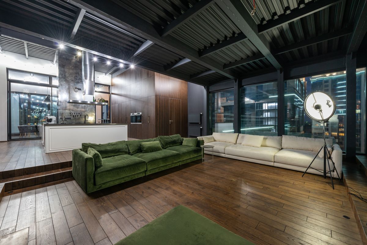 Wide-Plank Wood Flooring in an Open-Concept Loft Living Room